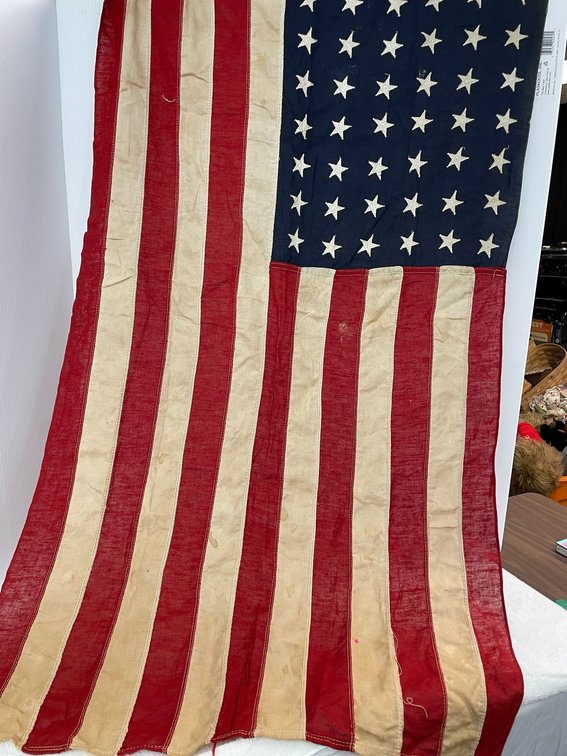 2 1/2' x 4' 48 star American flag**light damage in upper left corner by eyelet