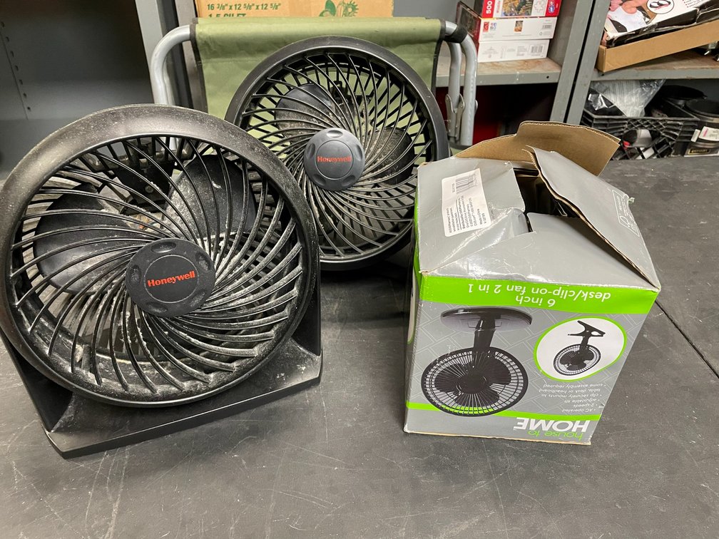2 Tabletop Honeywell fans, AC operated 2 speed adjustable tilt fan