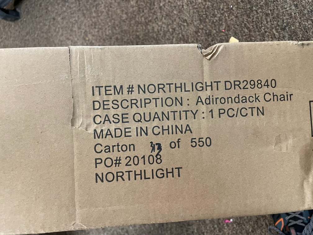 Unassembled adirondack chair