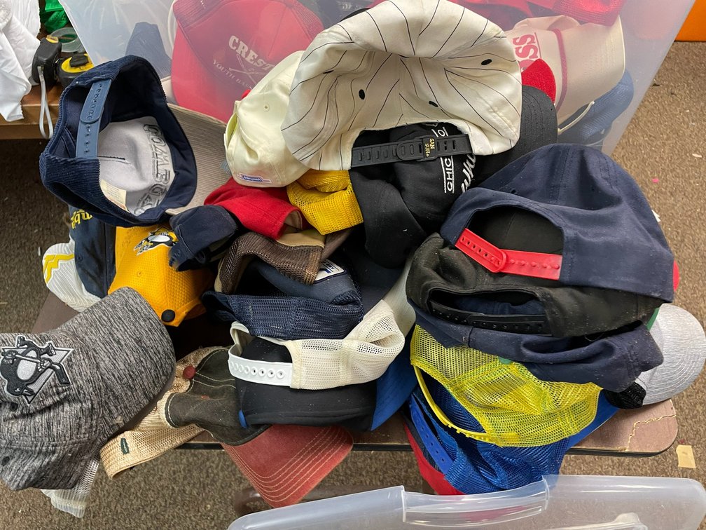 Large selection of baseball caps from the 1980's-present