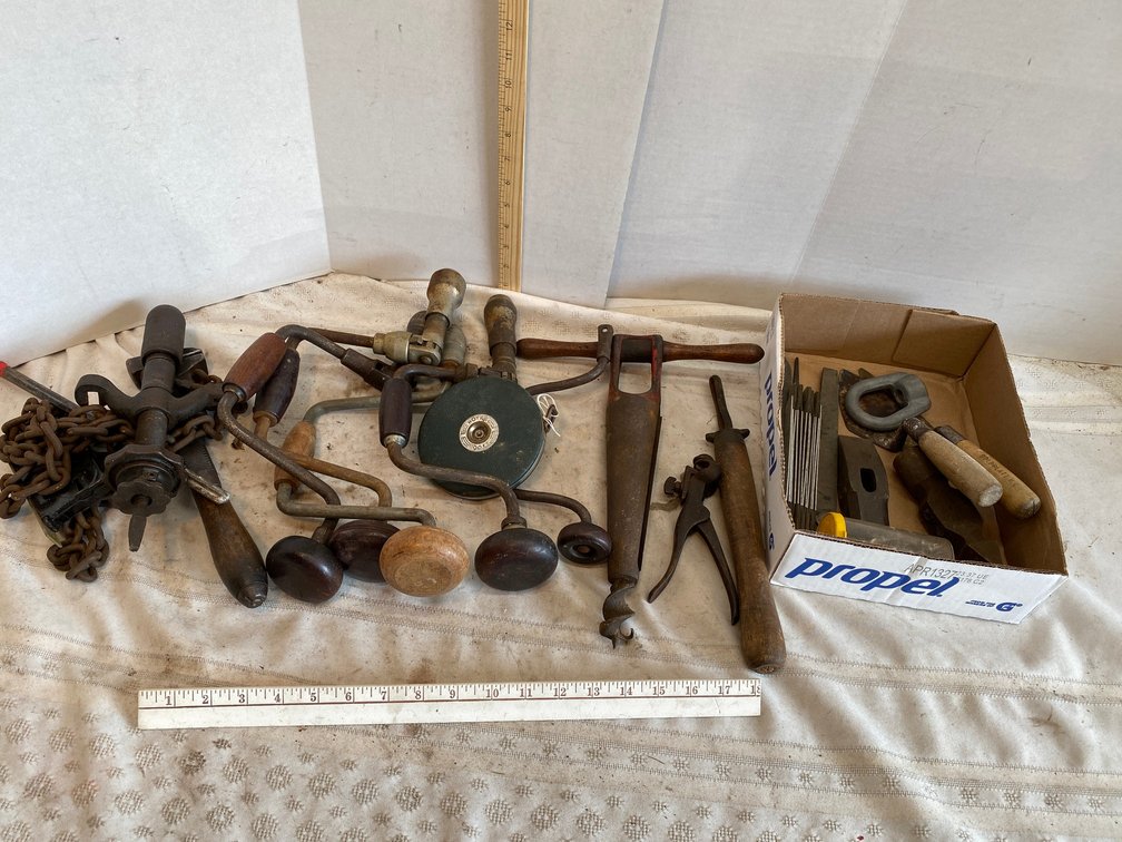 Braces, 100 Foot Tape Measure, Hammer Heads, small Trowels