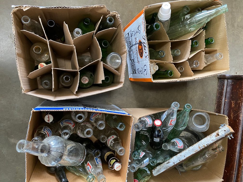 4-Boxes of glass Pop Bottles