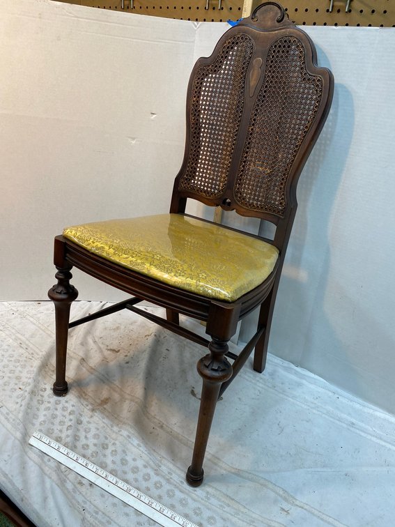 Chair with a Rattan Style Back and Cushion Bottom