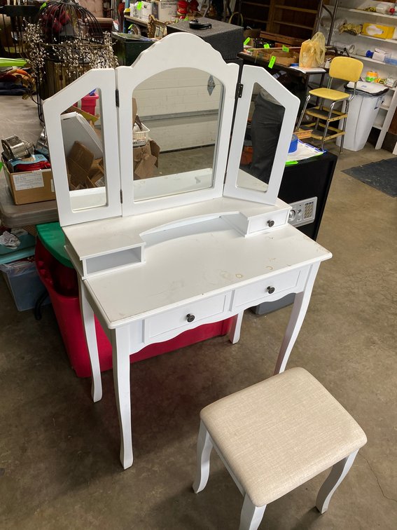 vanity has chips, missing drawer.