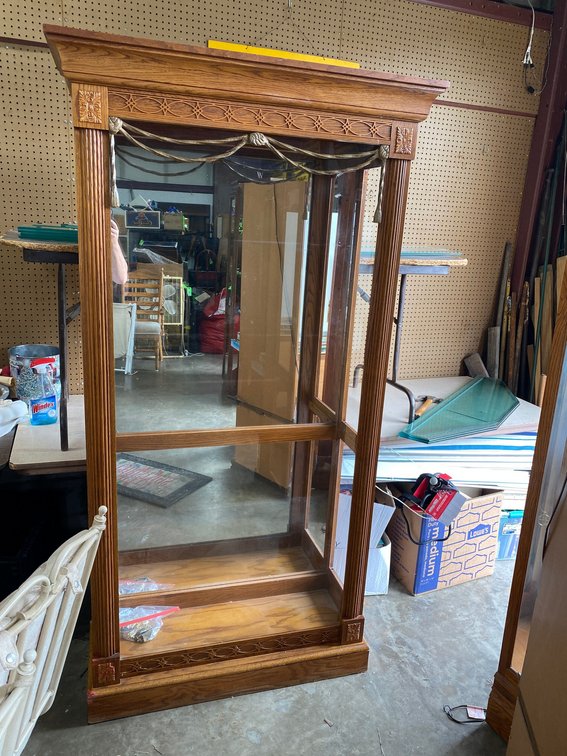 curio cabinet has damage