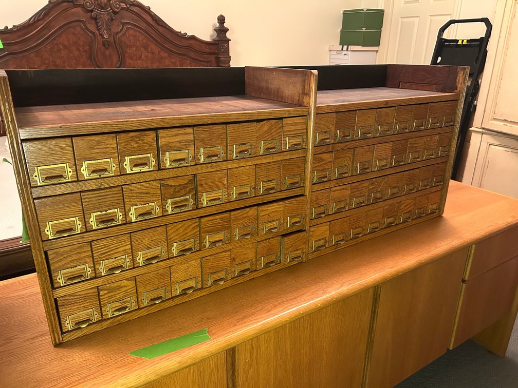 Antique stamped W C Heller and Company, Montpelier, Ohio Custom Crafted Cabinetry for libraries