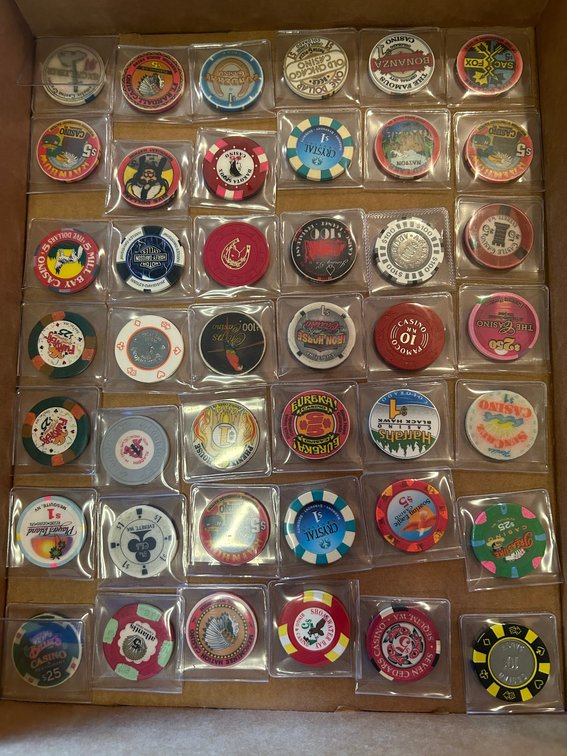 Collection of various casino poker chips-ranging in $1-$100 denominations