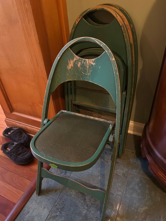 4 Green painted wooden folding chairs