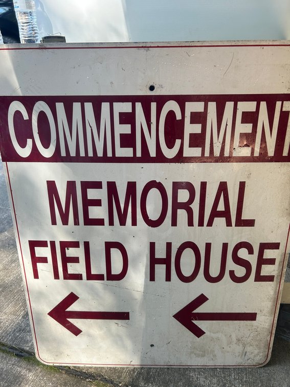 Commencement Memorial Field House sign