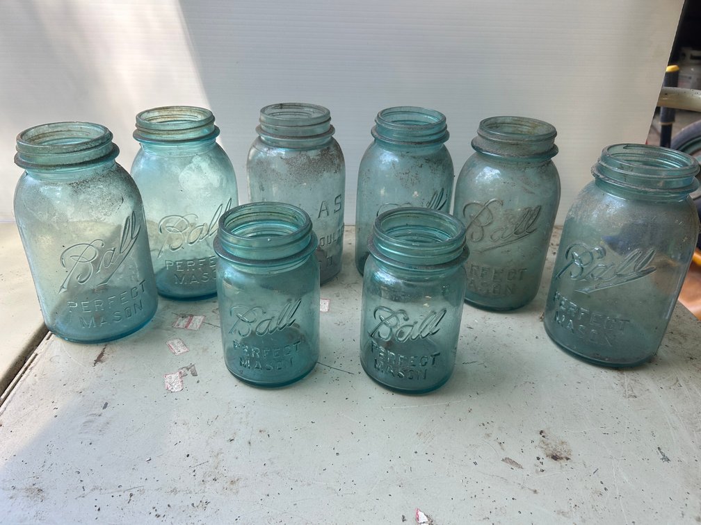 Selection of Ball and Atlas quart and pint blue canning jars