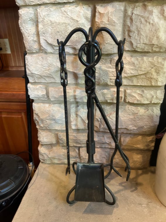 Cast metal fireplace tools