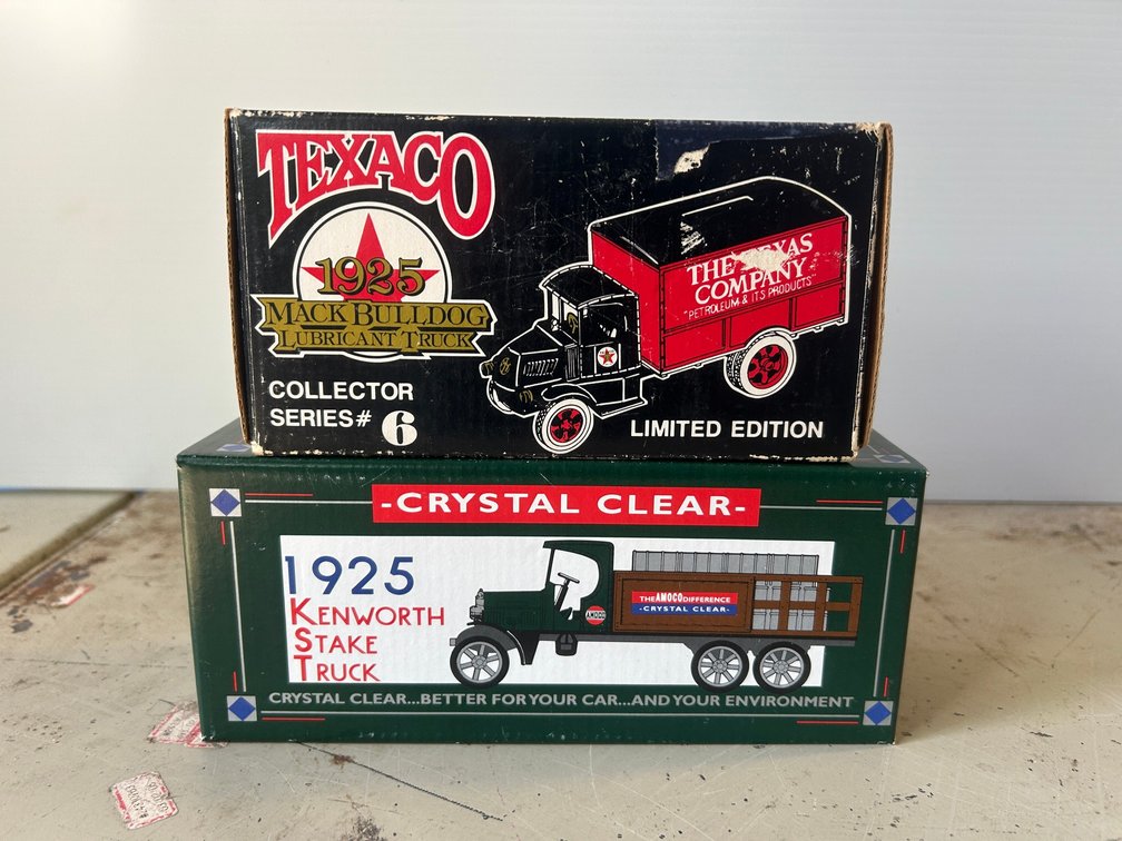2 Diecast metal coin banks-1 is 1925 Mack Bulldog, other is 1925 Kenworth Stake truck