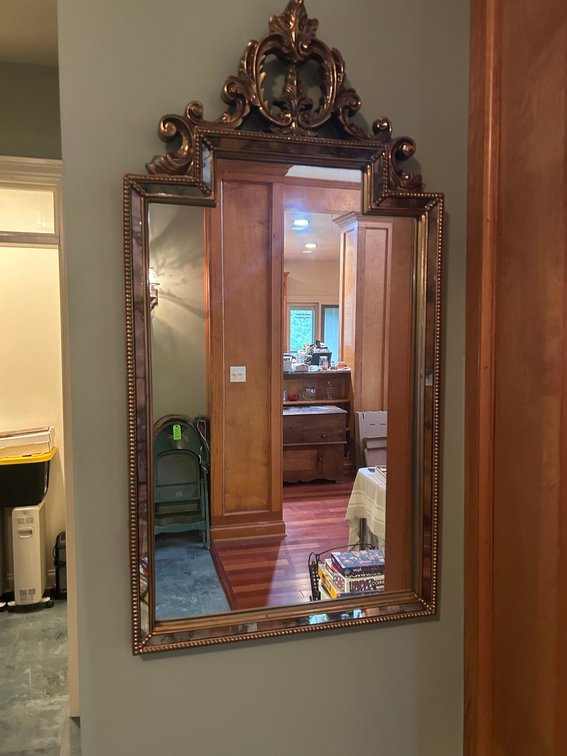 Ornate framed mirro