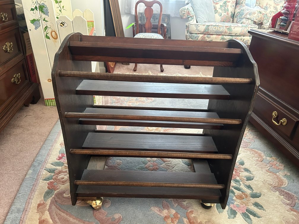 Magazine or newspaper stand on wheels