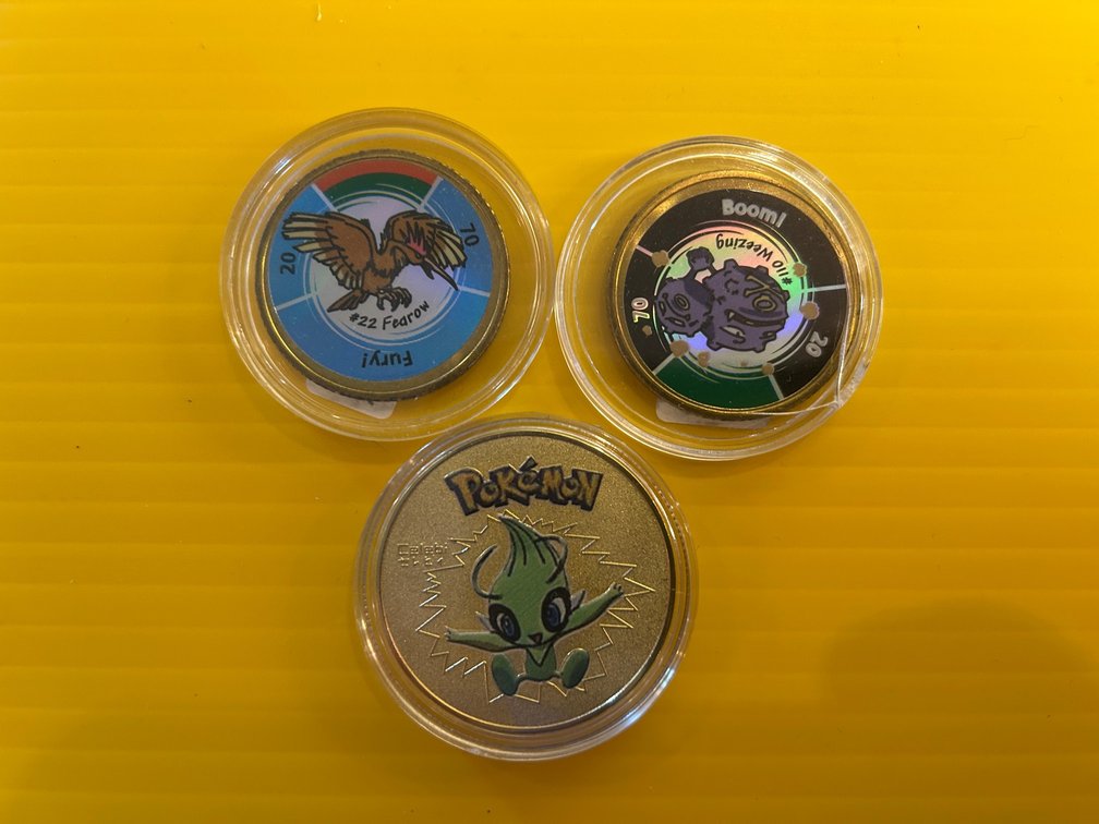 3 Pokemon collector coins