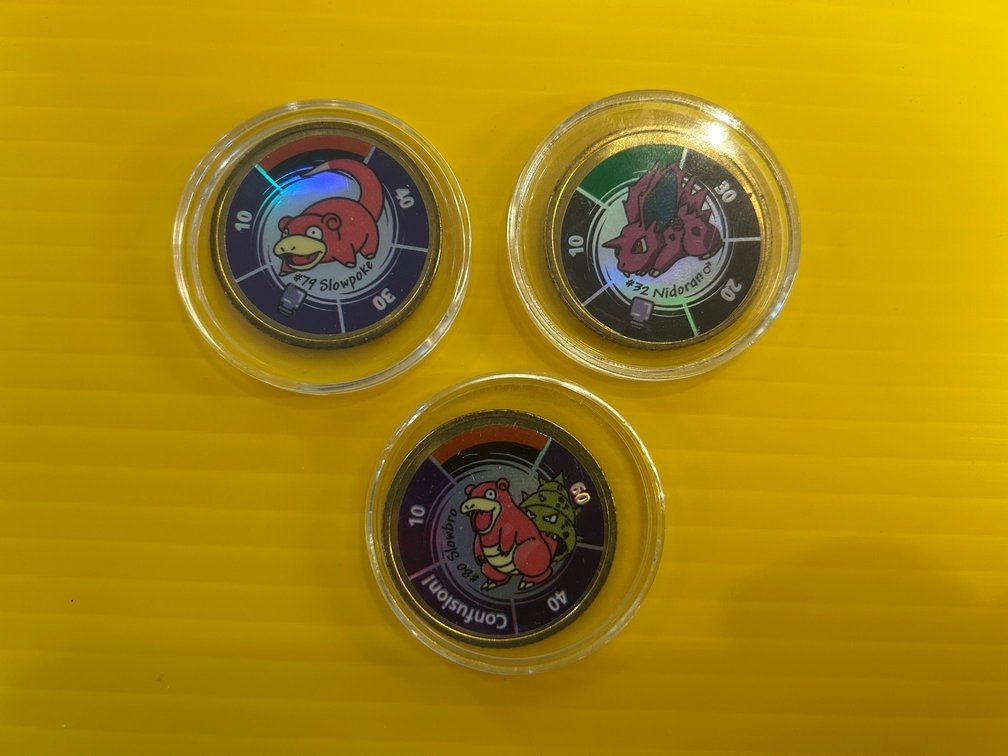 3 Pokemon collector coins