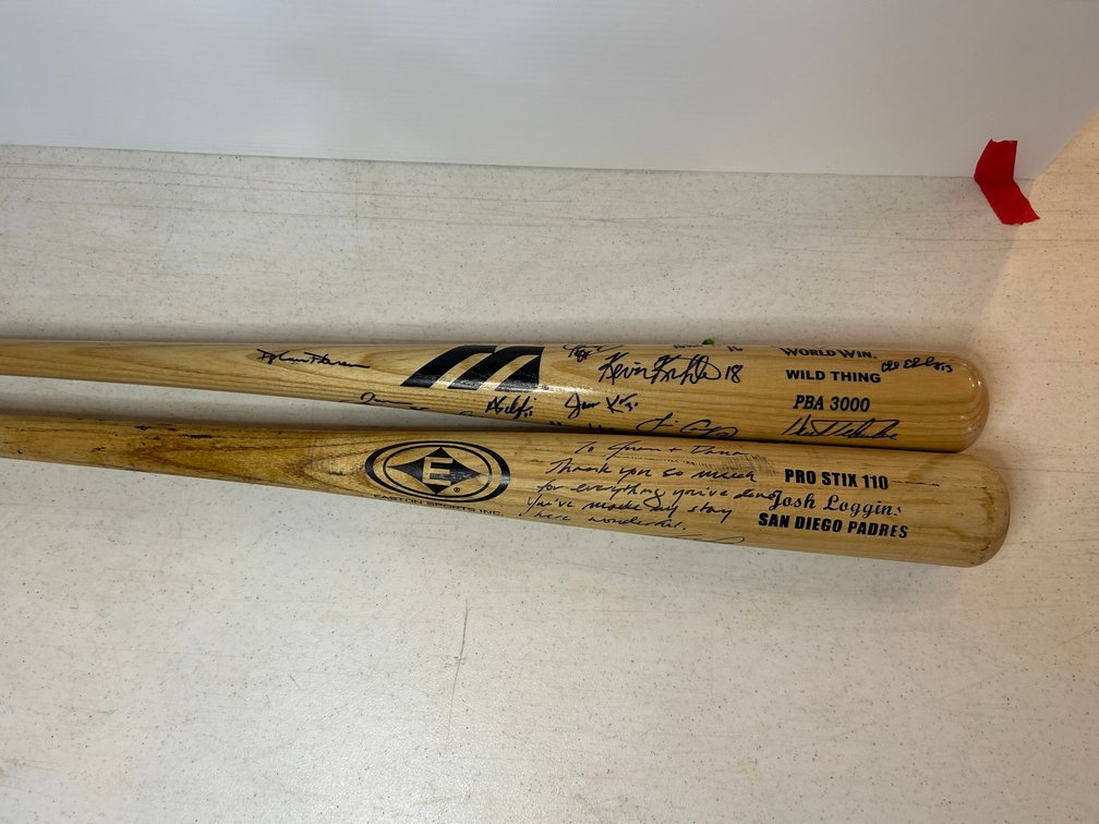 2 Wooden baseball bats with signatures-1 is from San Diego Padres
