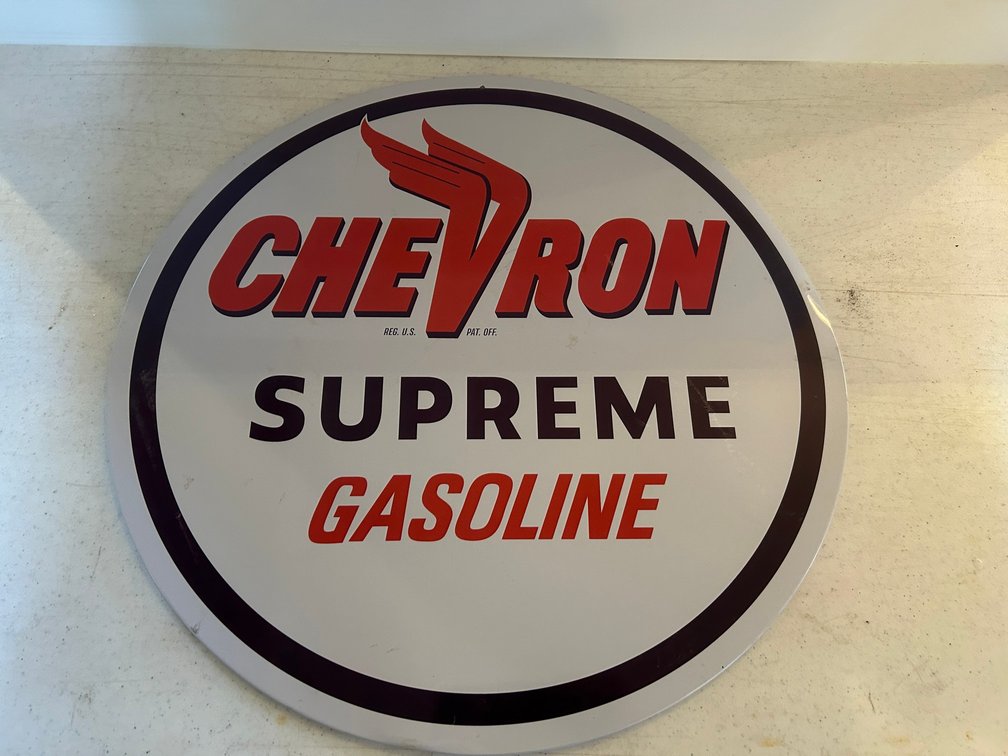 Metal Chevron Supreme Gasoline advertising sign