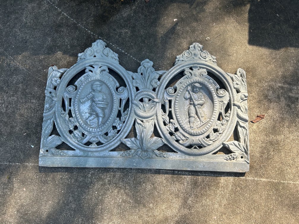 Cast panel for the rear of a garden bench-lightweight-possibly aluminum