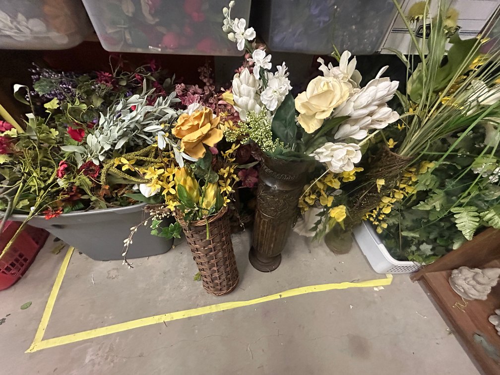 Faux floral arrangements, greenery
