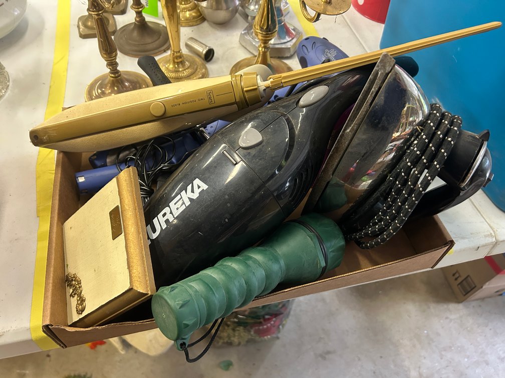 Hand held vacuum cleaner, iron