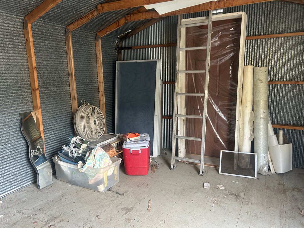 AC unit, new door in package, wind screens