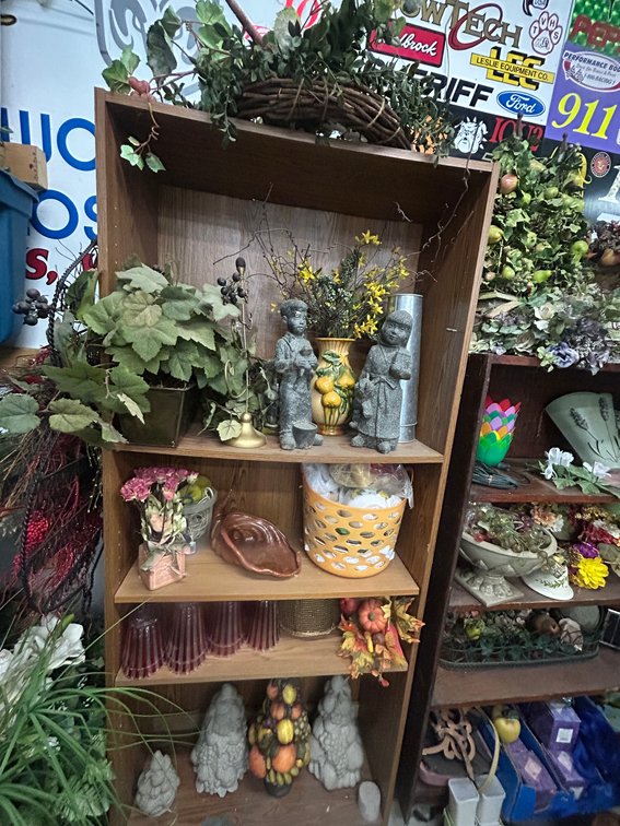 Wooden shelf with contents