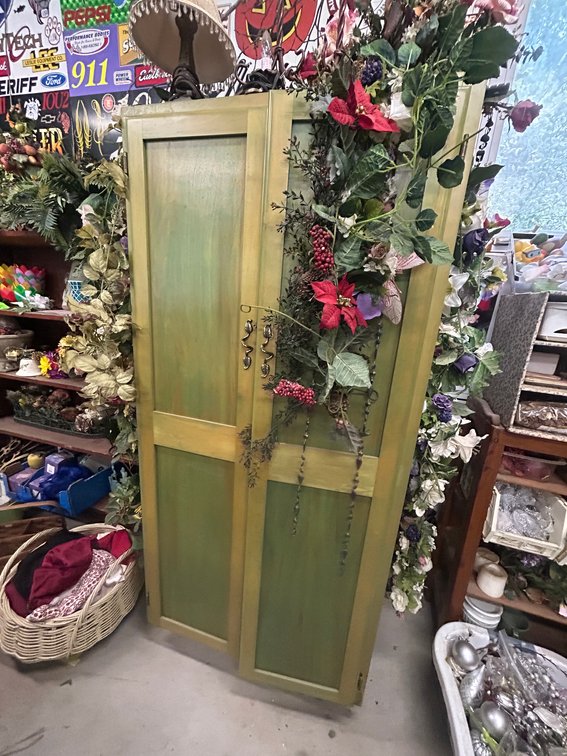 Wooden cabinet with contents