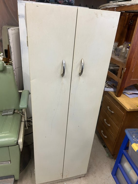 Metal cabinet with contents
