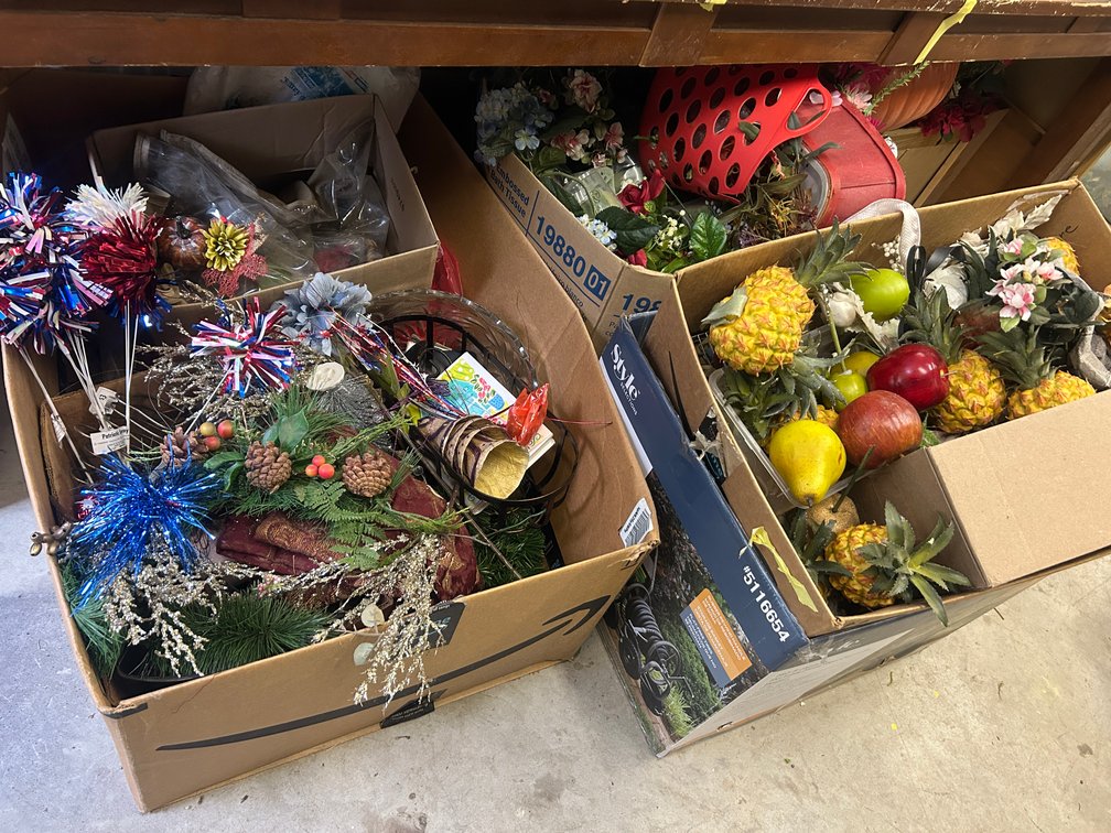 Several boxes of seasonal decorations