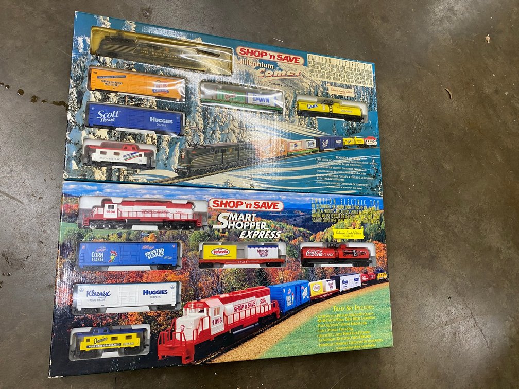 two shop n save trains. In boxes. Millennium comet and smart shopper express.