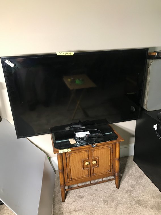 55" Samsung TV with wooden stand