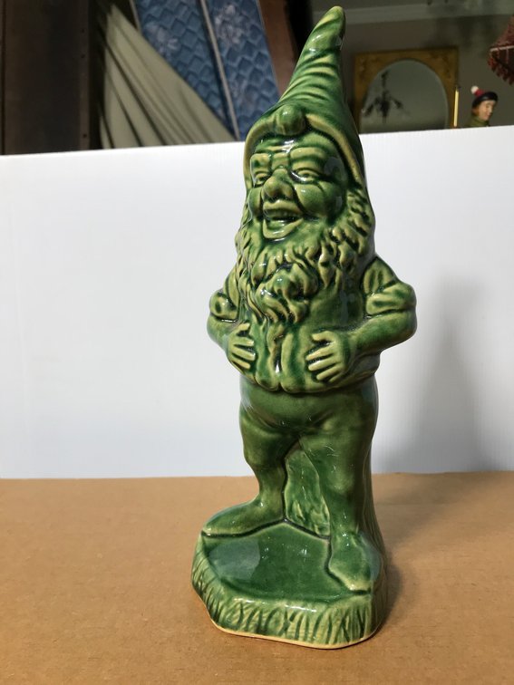 Green gnome figure