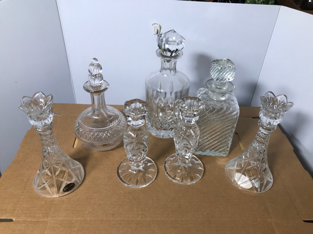 Glass and crystal decanters, candlesticks