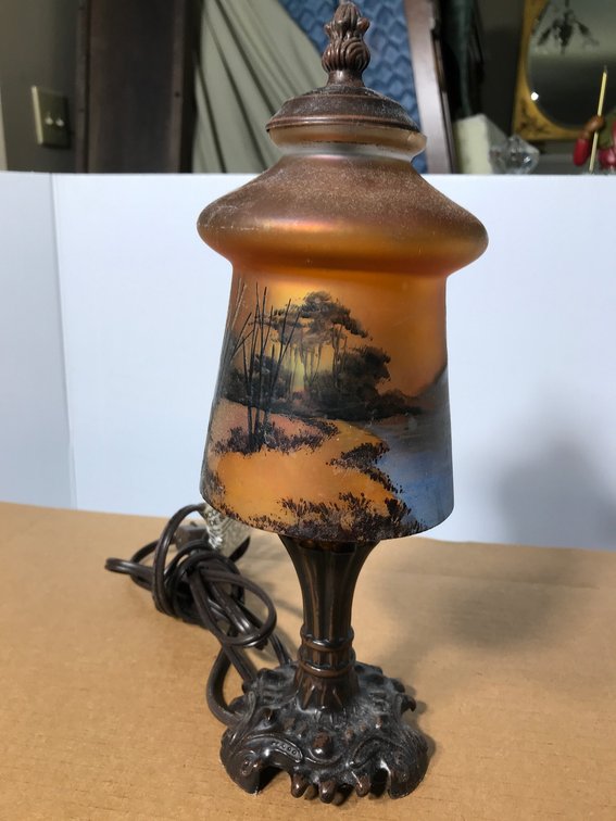 Lamp with decorated glass shade