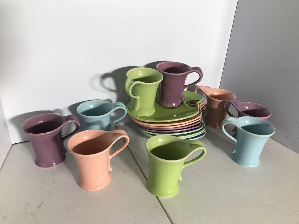 Mid-century plastic saucers with cups