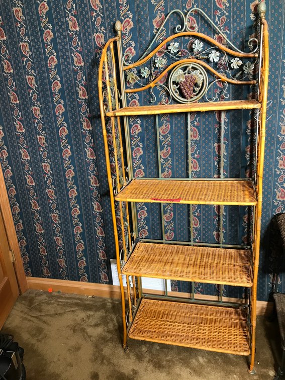Wicker and metal shelving unit