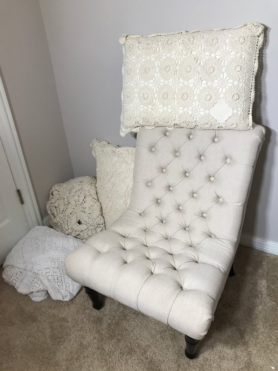 Upholtstered chair, pillows, blankets, etc.