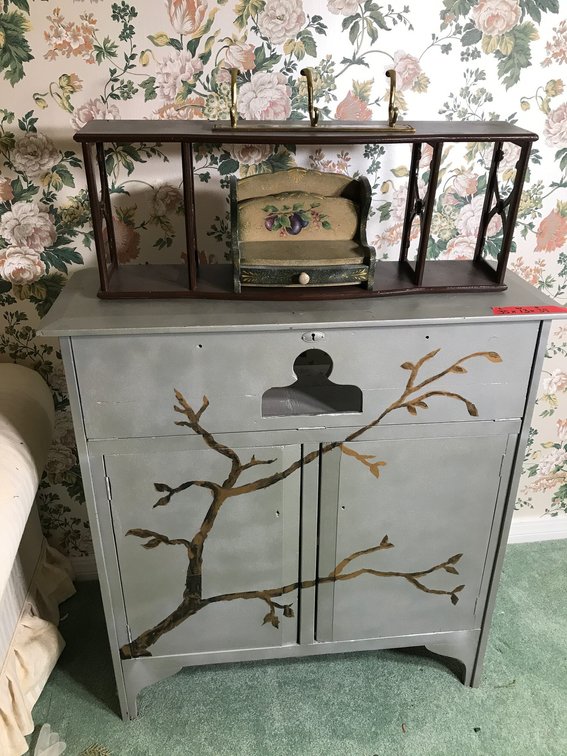 Wooden cabinet with doors and drop down front, wall shelf