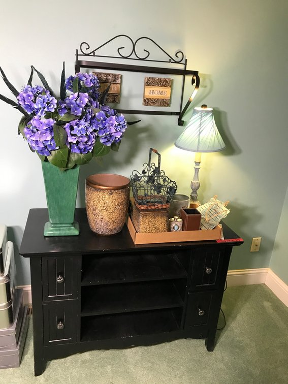 Dresser, flower pots, lamps, wall hangings