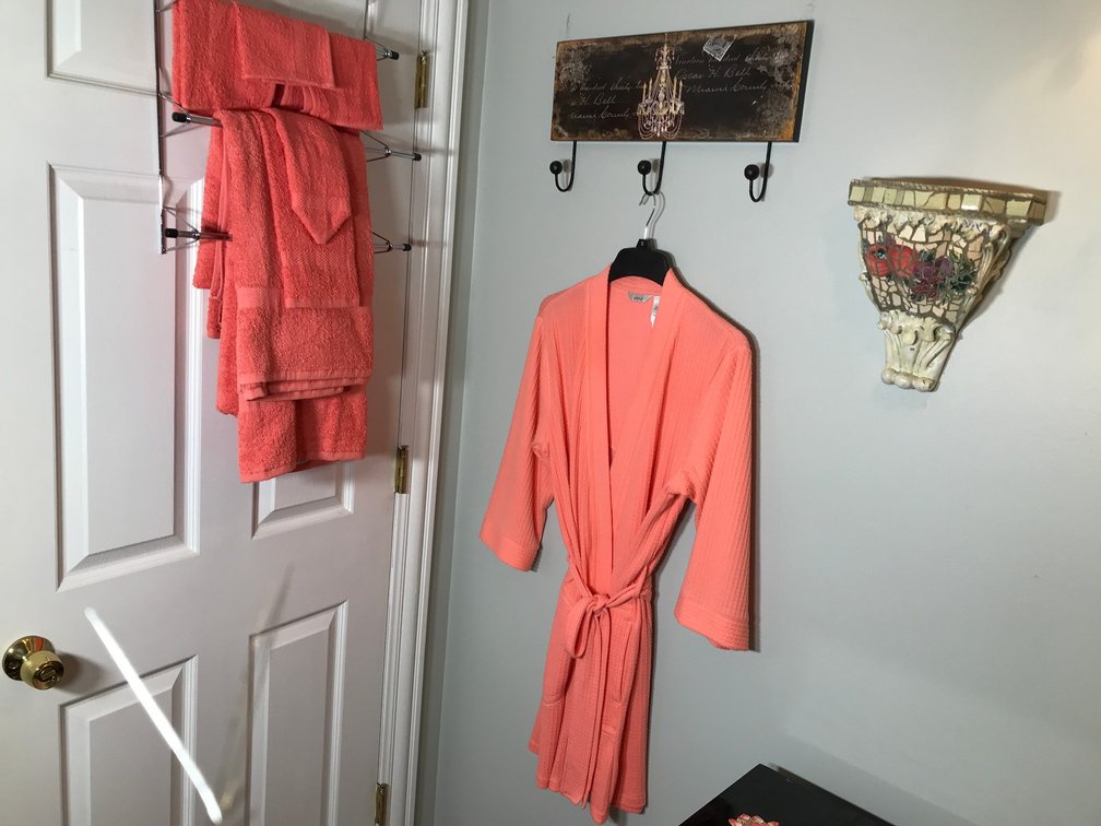 Towels, robe, wall hangings