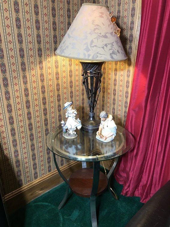 Glass top table, electric lamp, other decorations