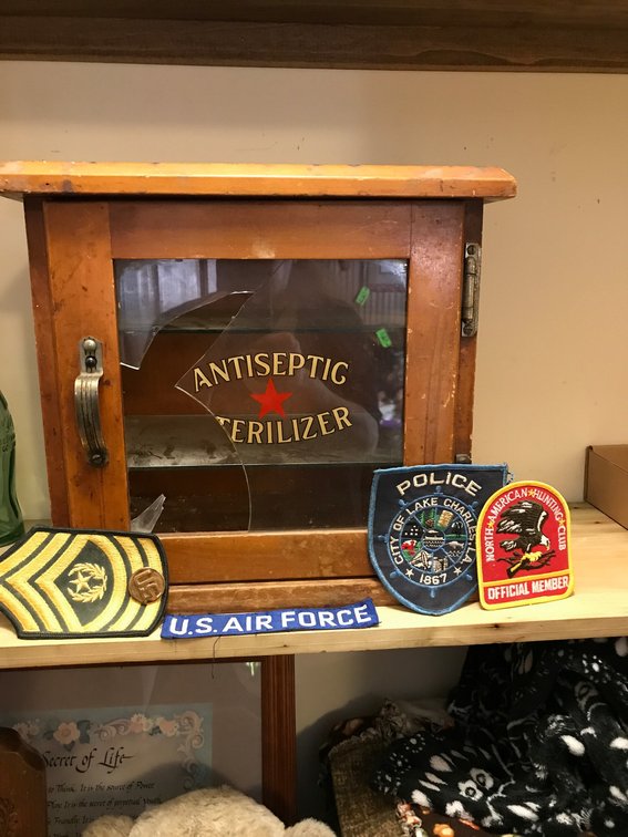 Wood and glass sterilizer cabinet with damage, Military and other patches
