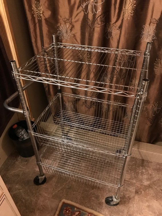 3 Shelf metal rolling rack on wheels