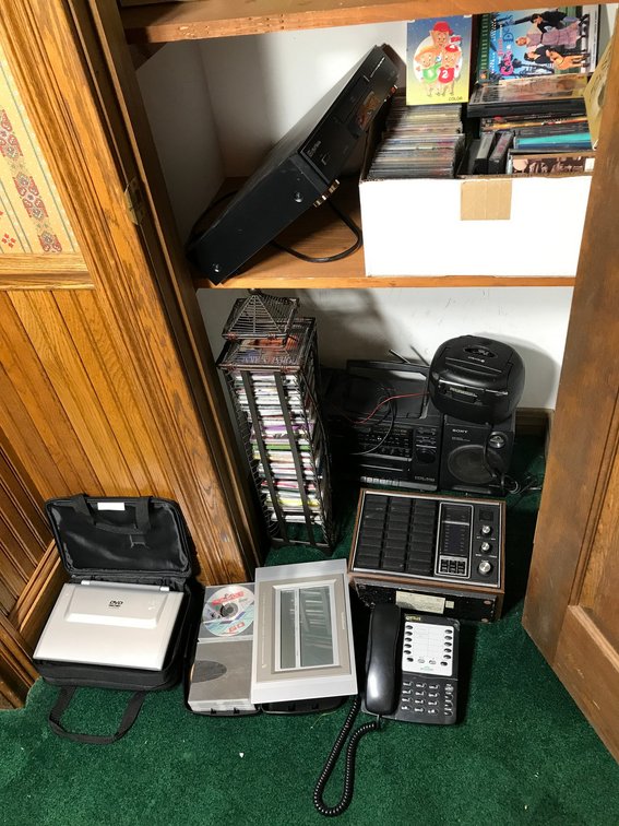 CDs, telephone, Sony stereo system, DVD player, etc.