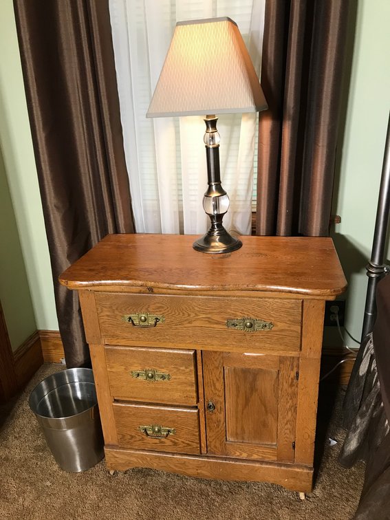 Oak washstand with drawers, electric lamp, garbage can, etc.