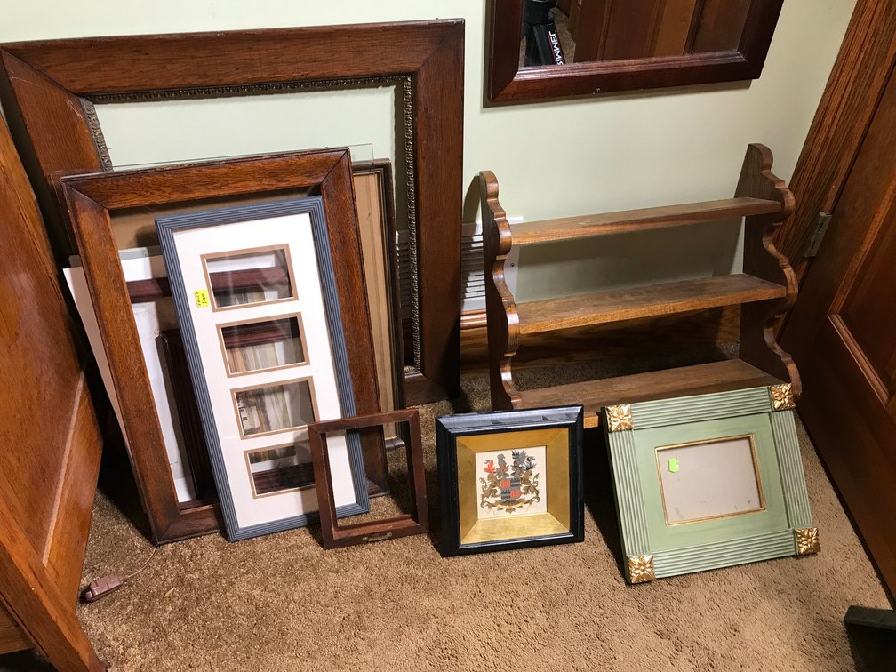 Grouping of picture frames, wall shelf, etc.