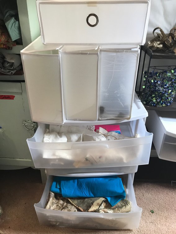 Storage containers-all contents included, including linens