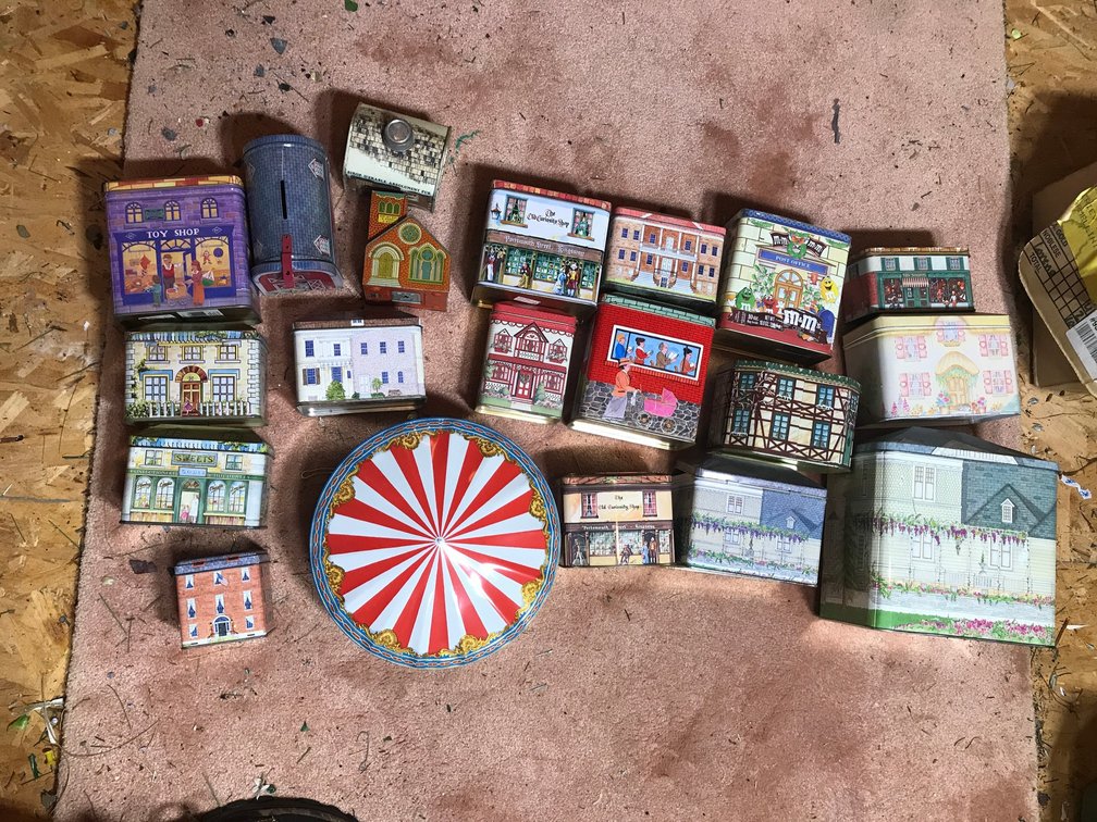 Collection of tins, metal bank