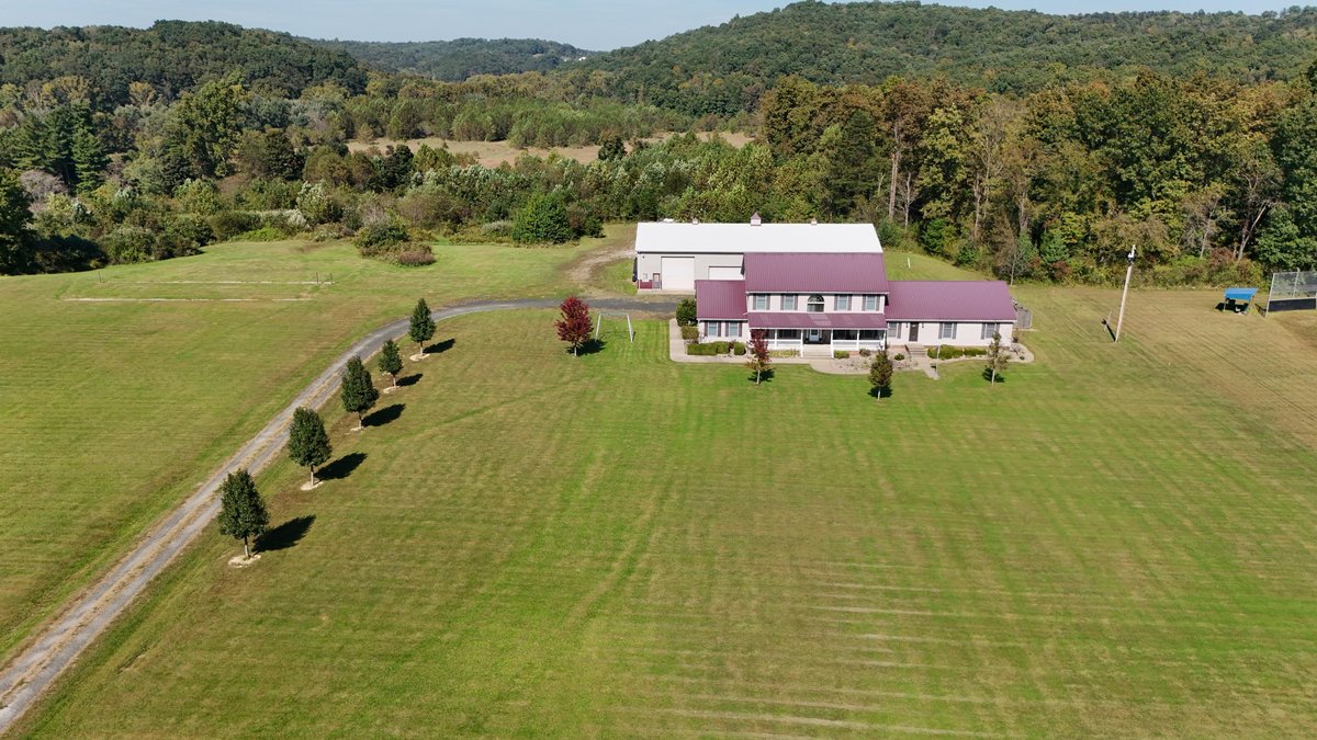 Image for Incredible 59 Acre Farm with 4 Bedroom Home & Spacious Commercial Garage in Wood County